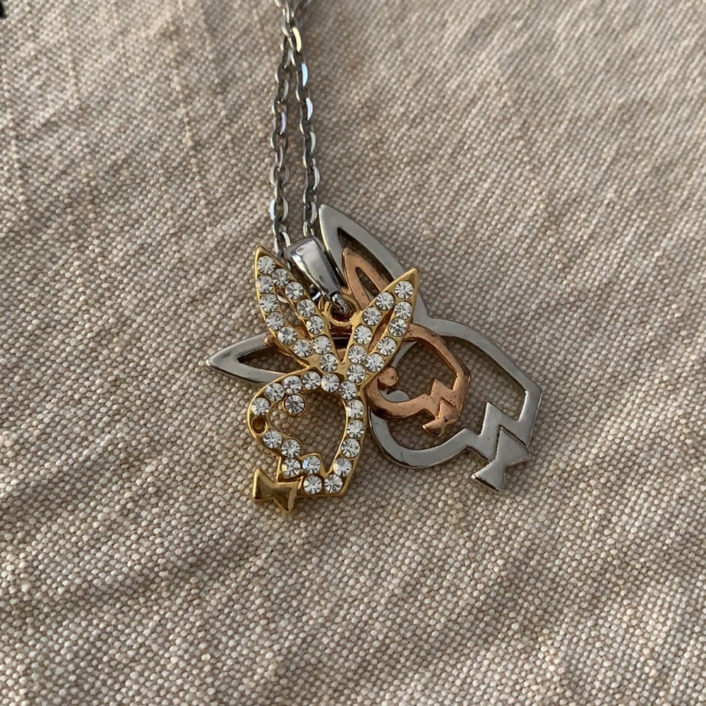 Playboy bunnies necklace.